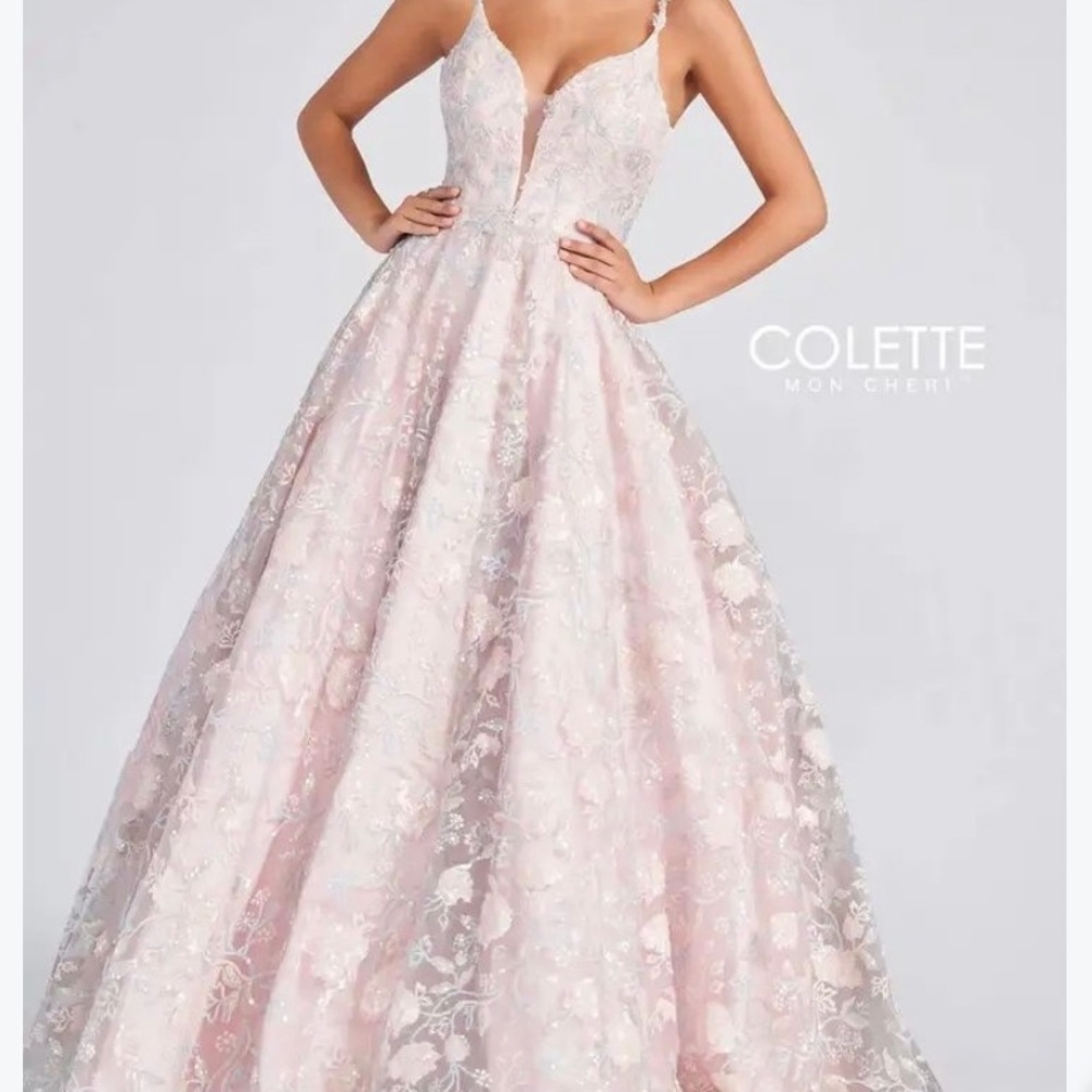 Pink Ball Gown. Worn once for an hour or so. Corset ties in back. Perfect.